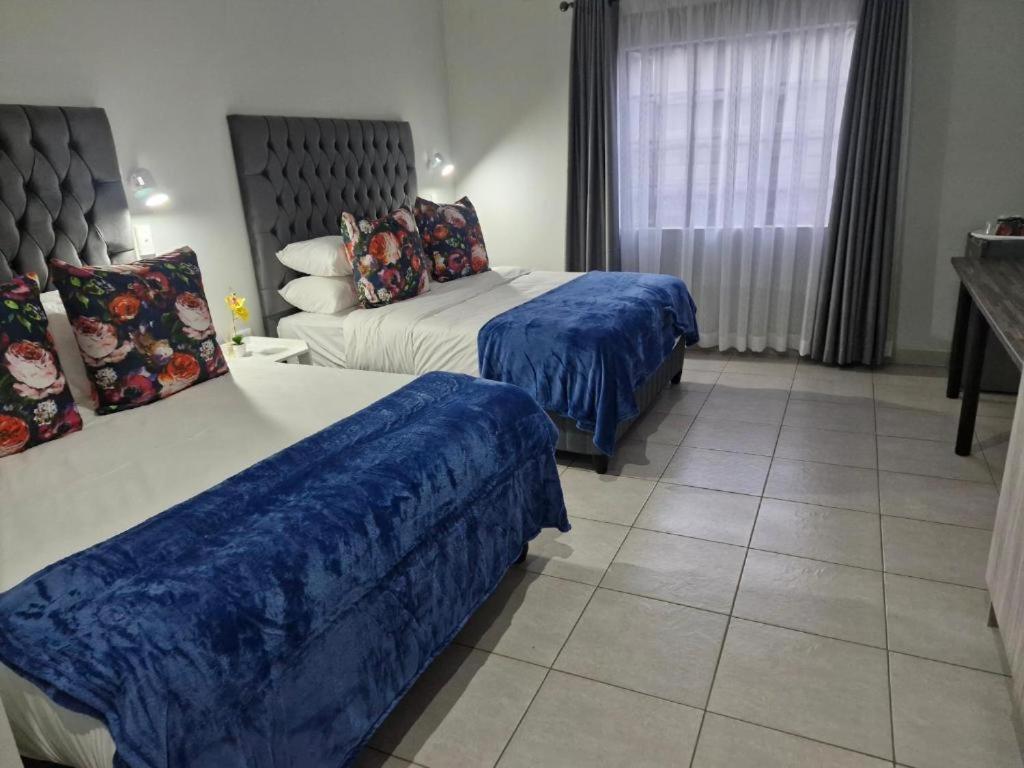 Blooming Rose Bed And Breakfast Πολοκουάνε Δωμάτιο φωτογραφία